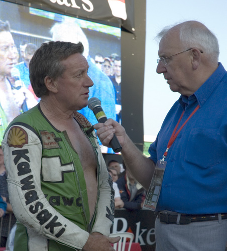 The late Geoff Cannell interviews TT legend Mick Grant at TT Legends on the Prom during the Centenary celebrations